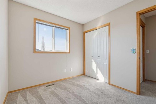 111 Luxstone Crescent Sw, Airdrie, AB - Indoor Photo Showing Other Room