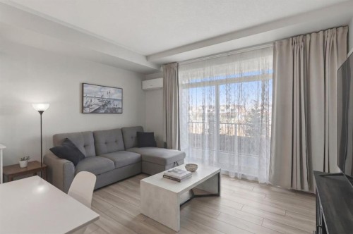 220-400 Auburn Meadows Common Se, Calgary, AB - Indoor Photo Showing Living Room