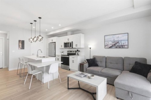 220-400 Auburn Meadows Common Se, Calgary, AB - Indoor Photo Showing Living Room