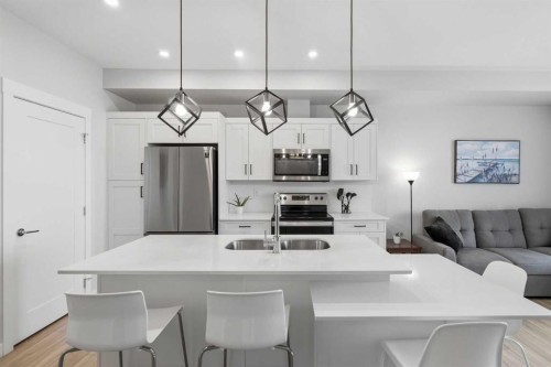 220-400 Auburn Meadows Common Se, Calgary, AB - Indoor Photo Showing Kitchen With Double Sink With Upgraded Kitchen