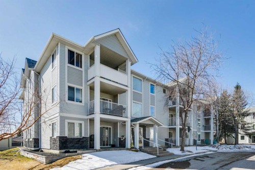 102-6102 Valleyview Park Se, Calgary, AB - Outdoor With Balcony With Facade