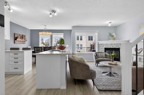 216 Royal Crest View Nw, Calgary, AB - Indoor With Fireplace