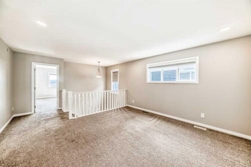 35 Lucas Terrace Nw, Calgary, AB - Indoor Photo Showing Other Room