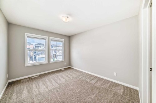 35 Lucas Terrace Nw, Calgary, AB - Indoor Photo Showing Other Room