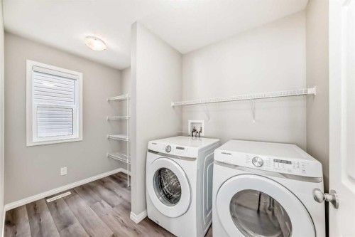 35 Lucas Terrace Nw, Calgary, AB - Indoor Photo Showing Laundry Room