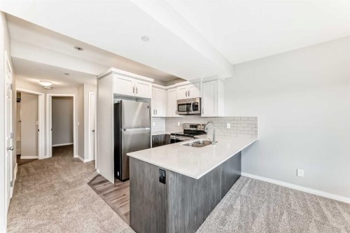 35 Lucas Terrace Nw, Calgary, AB - Indoor Photo Showing Kitchen With Double Sink