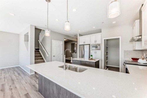 35 Lucas Terrace Nw, Calgary, AB - Indoor Photo Showing Kitchen With Double Sink With Upgraded Kitchen