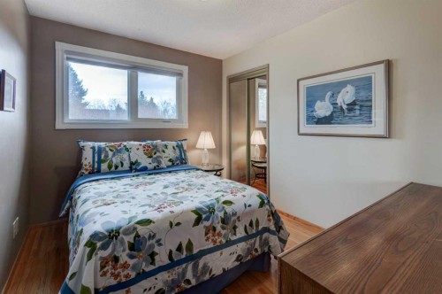 1032 Cantabrian Drive Sw, Calgary, AB - Indoor Photo Showing Bedroom