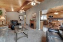 1032 Cantabrian Drive Sw, Calgary, AB  - Indoor Photo Showing Living Room 