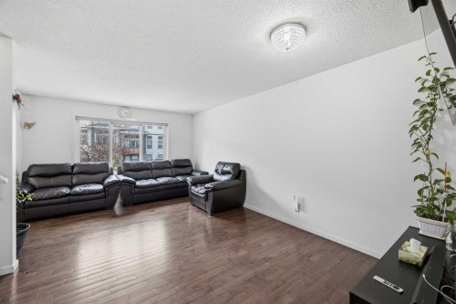 98 Panatella Hill Nw, Calgary, AB - Indoor Photo Showing Living Room