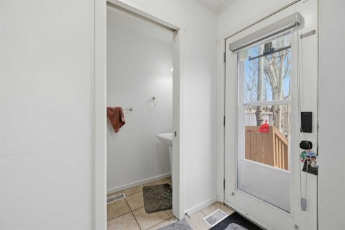 98 Panatella Hill Nw, Calgary, AB - Indoor Photo Showing Other Room