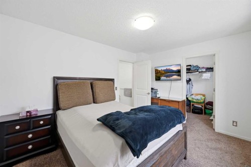 98 Panatella Hill Nw, Calgary, AB - Indoor Photo Showing Bedroom
