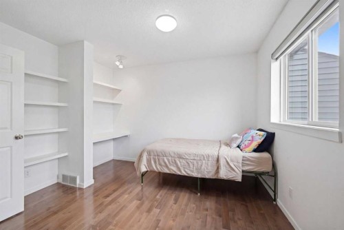 98 Panatella Hill Nw, Calgary, AB - Indoor Photo Showing Bedroom