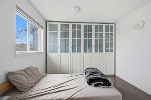 98 Panatella Hill Nw, Calgary, AB - Indoor Photo Showing Bedroom