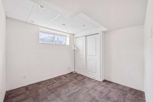 98 Panatella Hill Nw, Calgary, AB - Indoor Photo Showing Other Room