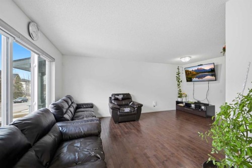 98 Panatella Hill Nw, Calgary, AB - Indoor Photo Showing Living Room