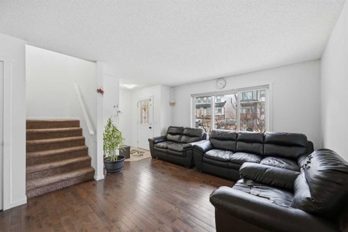 98 Panatella Hill Nw, Calgary, AB - Indoor Photo Showing Living Room