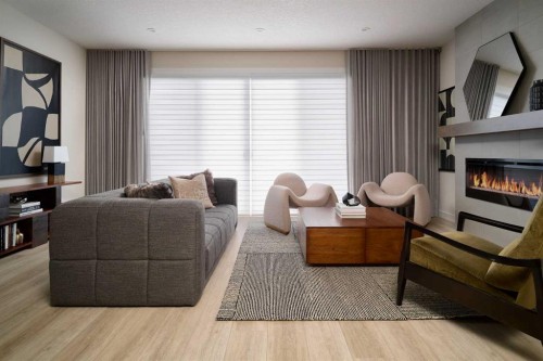 124 Royston Gardens Nw, Calgary, AB - Indoor Photo Showing Living Room With Fireplace
