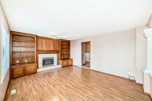 37 Arbour Wood Place Nw, Calgary, AB - Indoor Photo Showing Living Room With Fireplace