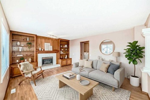 37 Arbour Wood Place Nw, Calgary, AB - Indoor Photo Showing Living Room With Fireplace