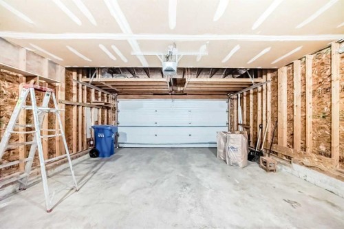 37 Arbour Wood Place Nw, Calgary, AB - Indoor Photo Showing Garage