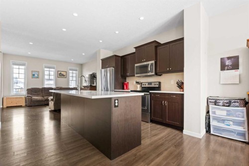 53 Amery Crescent, Crossfield, AB - Indoor Photo Showing Kitchen With Upgraded Kitchen