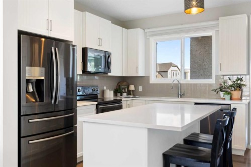 44 Marquis Link Se, Calgary, AB - Indoor Photo Showing Kitchen With Upgraded Kitchen