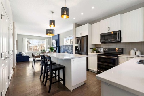 44 Marquis Link Se, Calgary, AB - Indoor Photo Showing Kitchen With Double Sink With Upgraded Kitchen