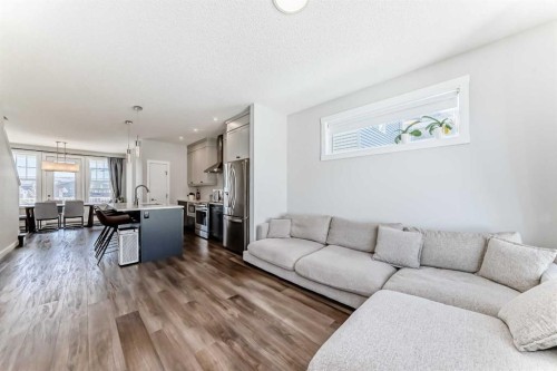 172 Rowmont Boulevard Nw, Calgary, AB - Indoor Photo Showing Living Room
