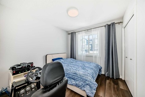 172 Rowmont Boulevard Nw, Calgary, AB - Indoor Photo Showing Bedroom