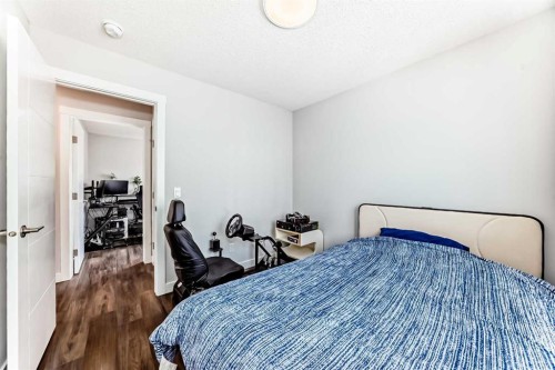 172 Rowmont Boulevard Nw, Calgary, AB - Indoor Photo Showing Bedroom