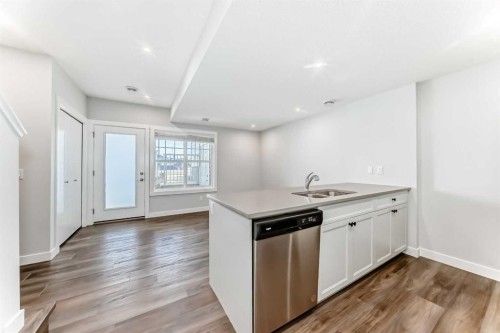 172 Rowmont Boulevard Nw, Calgary, AB - Indoor Photo Showing Kitchen With Double Sink