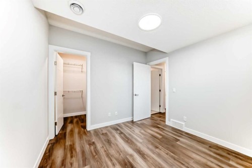 172 Rowmont Boulevard Nw, Calgary, AB - Indoor Photo Showing Other Room