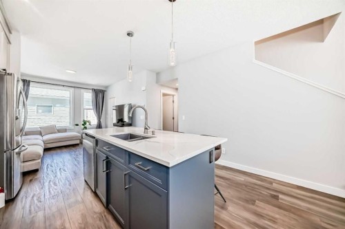 172 Rowmont Boulevard Nw, Calgary, AB - Indoor Photo Showing Kitchen With Double Sink With Upgraded Kitchen