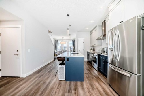 172 Rowmont Boulevard Nw, Calgary, AB - Indoor Photo Showing Kitchen With Stainless Steel Kitchen With Upgraded Kitchen