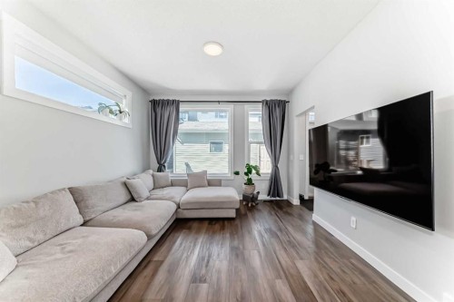 172 Rowmont Boulevard Nw, Calgary, AB - Indoor Photo Showing Living Room