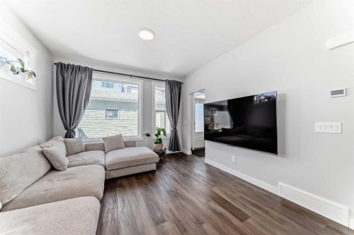 172 Rowmont Boulevard Nw, Calgary, AB - Indoor Photo Showing Living Room