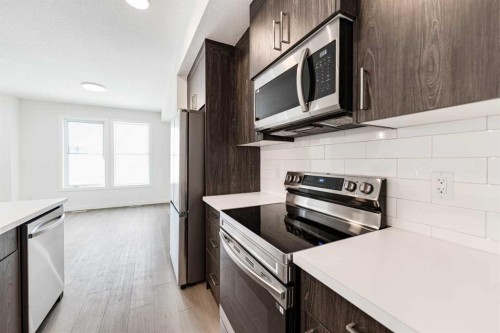 1921 Mccaskill Drive, Crossfield, AB - Indoor Photo Showing Kitchen
