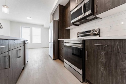 1921 Mccaskill Drive, Crossfield, AB - Indoor Photo Showing Kitchen