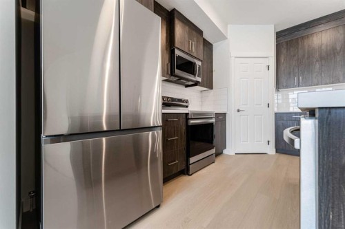 1921 Mccaskill Drive, Crossfield, AB - Indoor Photo Showing Kitchen
