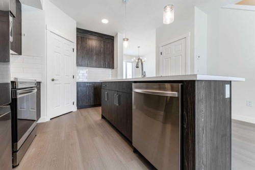1921 Mccaskill Drive, Crossfield, AB - Indoor Photo Showing Kitchen