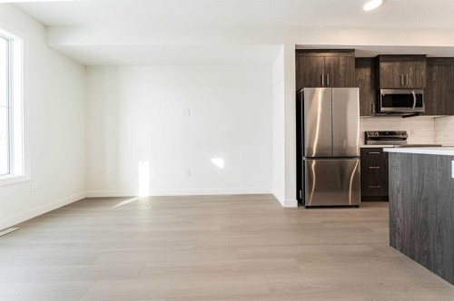 1921 Mccaskill Drive, Crossfield, AB - Indoor Photo Showing Kitchen