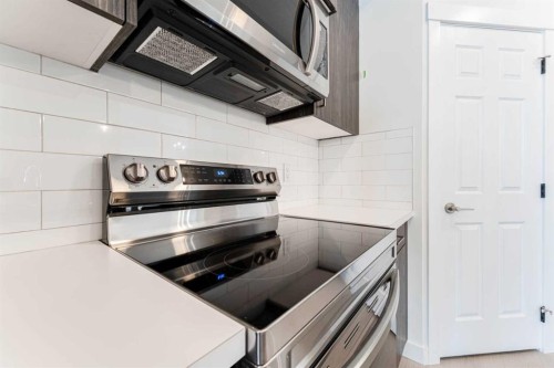 1921 Mccaskill Drive, Crossfield, AB - Indoor Photo Showing Kitchen