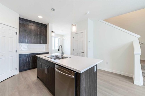 1921 Mccaskill Drive, Crossfield, AB - Indoor Photo Showing Kitchen With Double Sink