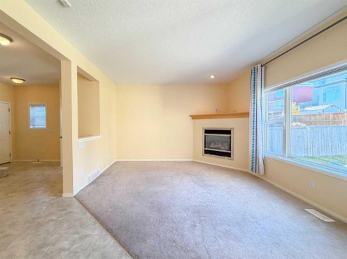 21 Panamount Hill Nw, Calgary, AB - Indoor With Fireplace