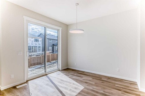 1069 Sawgrass Link Nw, Airdrie, AB - Indoor Photo Showing Other Room