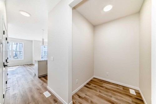 1069 Sawgrass Link Nw, Airdrie, AB - Indoor Photo Showing Other Room