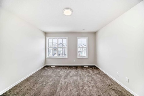 1069 Sawgrass Link Nw, Airdrie, AB - Indoor Photo Showing Other Room