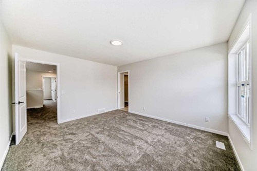 1069 Sawgrass Link Nw, Airdrie, AB - Indoor Photo Showing Other Room
