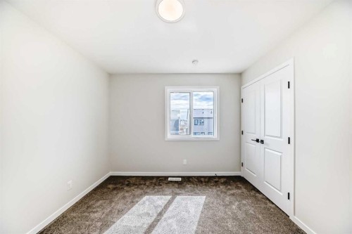 1069 Sawgrass Link Nw, Airdrie, AB - Indoor Photo Showing Other Room
